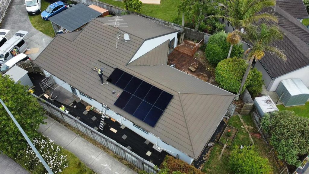 Rooftop home solar panels installed on a residential home in New Zealand.
