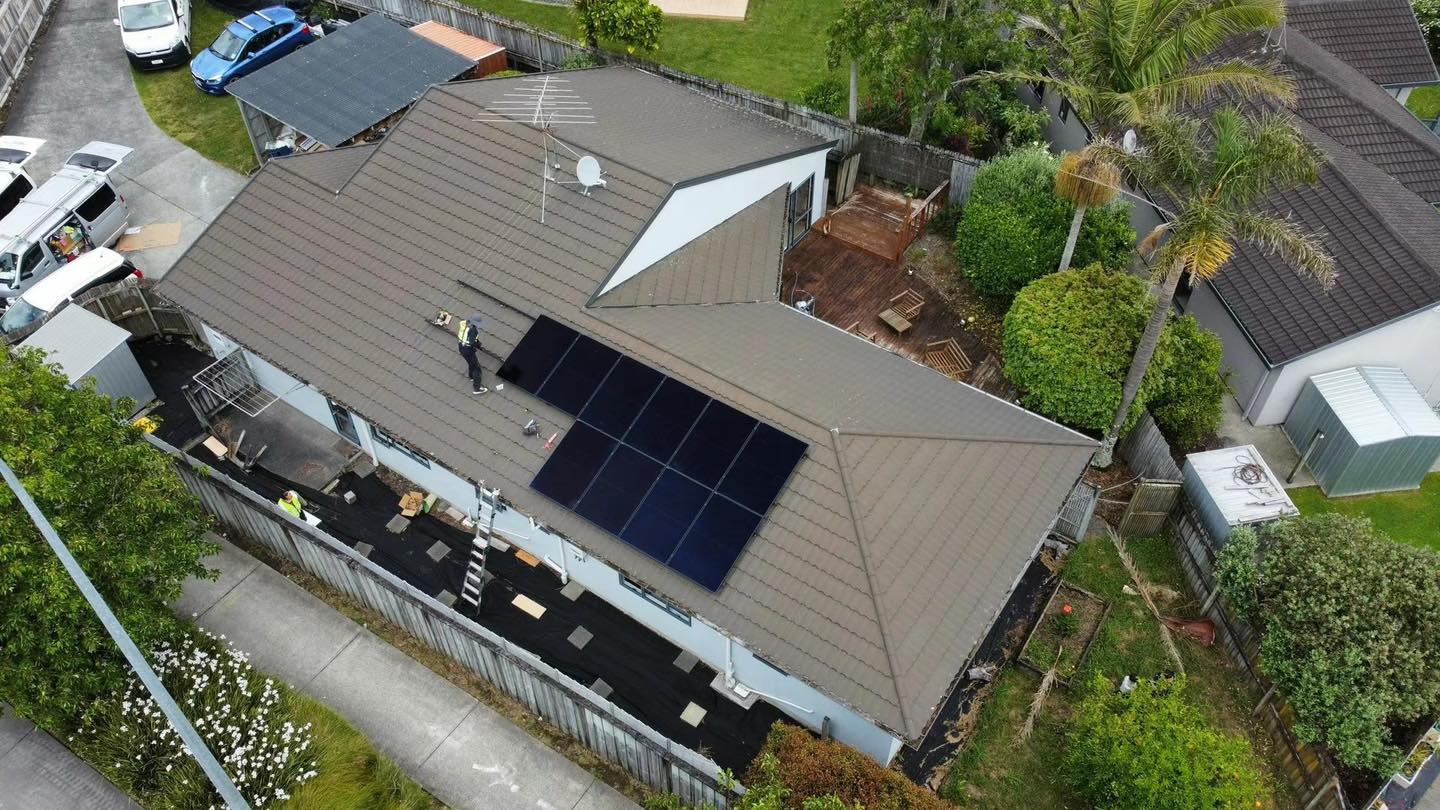 Rooftop home solar panels installed on a residential home in New Zealand.